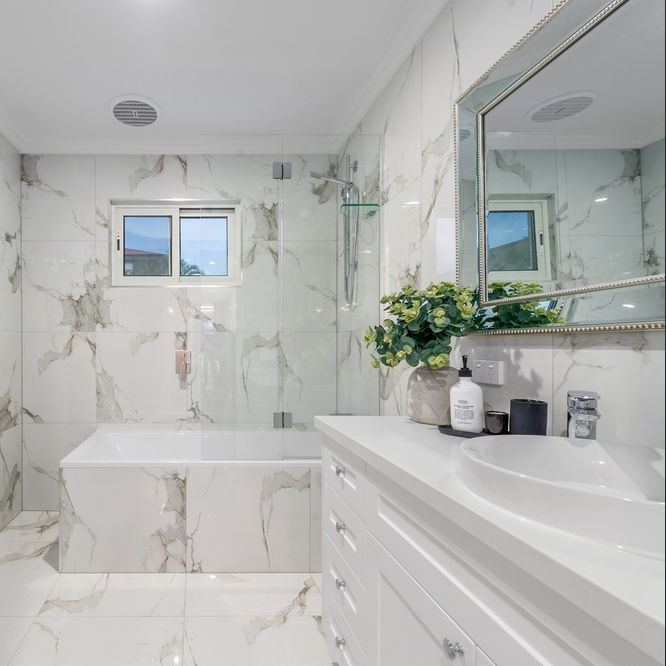 Silver Beaded Style Frame Horizontal Mirror in Marble Bathroom