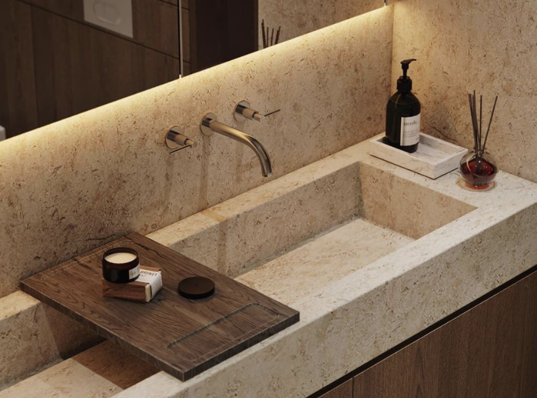 Bathroom Countertop Finishes - recessed sink design with gold tapware